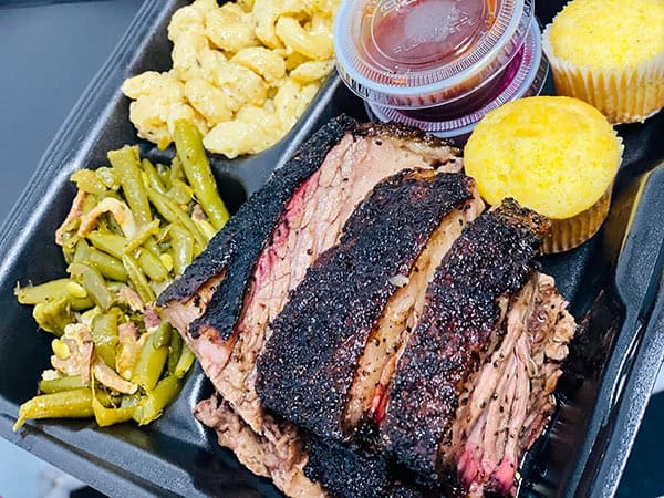 Jay’s Smokin BBQ Pit Plate with brisket and pulled pork, green beans and gouda mac and cheese