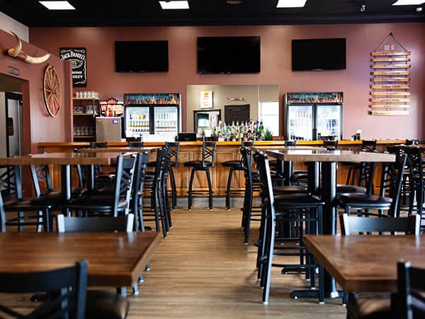 View of the main dining and bar areas at Jay’s Smokin BBQ in Punta Gorda