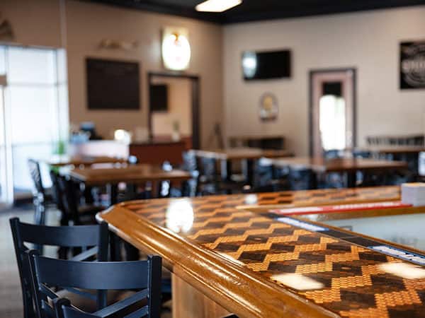 Penny inlaid bar at Jay’s Smokin BBQ at the old Muscle Car City in Punta Gorda